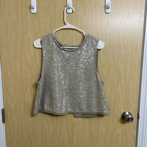 Free people tan/ silver open back tank. Worn once.